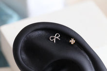 Load image into Gallery viewer, Mini Ribbon Cartilage Stud • Tiny Conch Labret • Bow Threadless Pushback • 18g Flat Back Lobe Earring • Tie the Knot Piercing • Dainty Stud